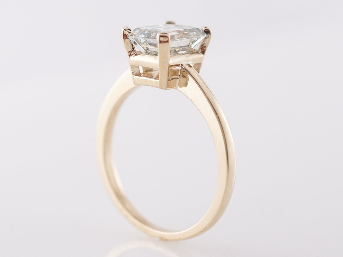 Emerald Cut Diamond Engagement Ring in Yellow Gold