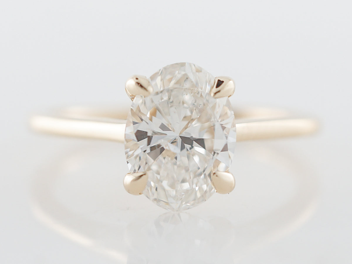Oval Diamond Solitaire Engagement Ring in Yellow Gold