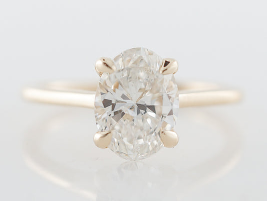 Oval Diamond Solitaire Engagement Ring in Yellow Gold