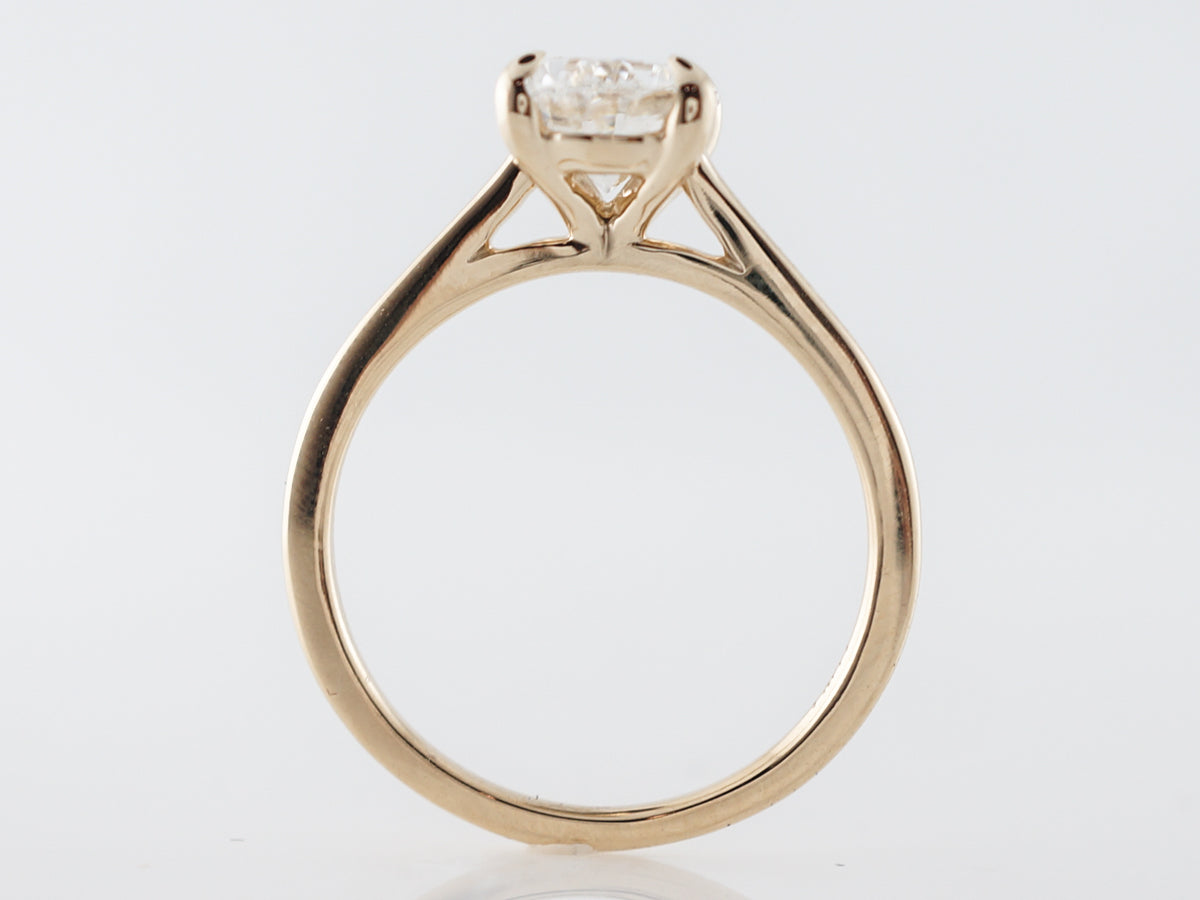 Oval Diamond Solitaire Engagement Ring in Yellow Gold