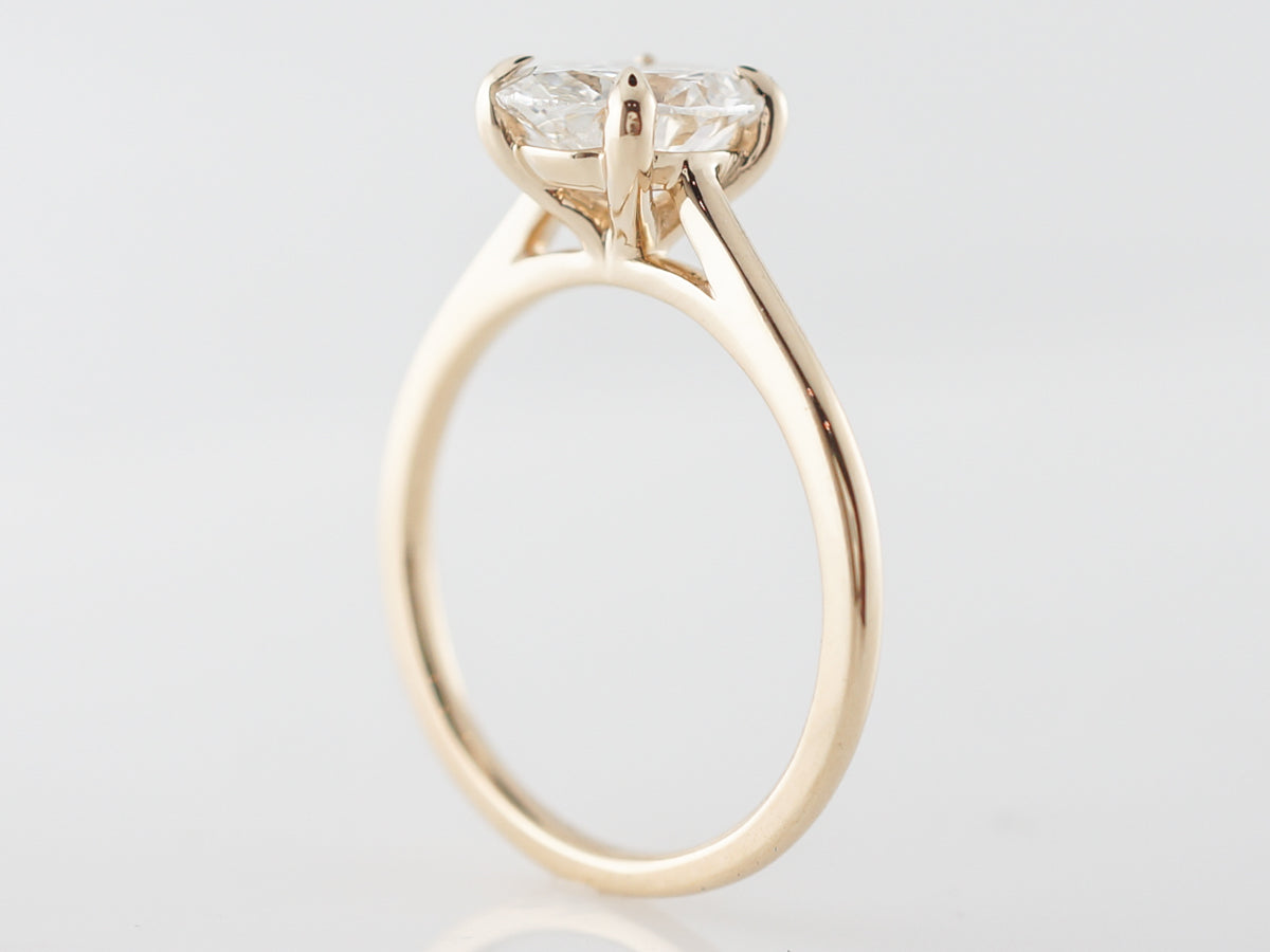 Oval Diamond Solitaire Engagement Ring in Yellow Gold