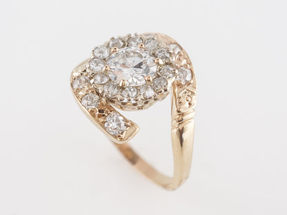 Twisting Diamond Engagement Ring in Yellow Gold