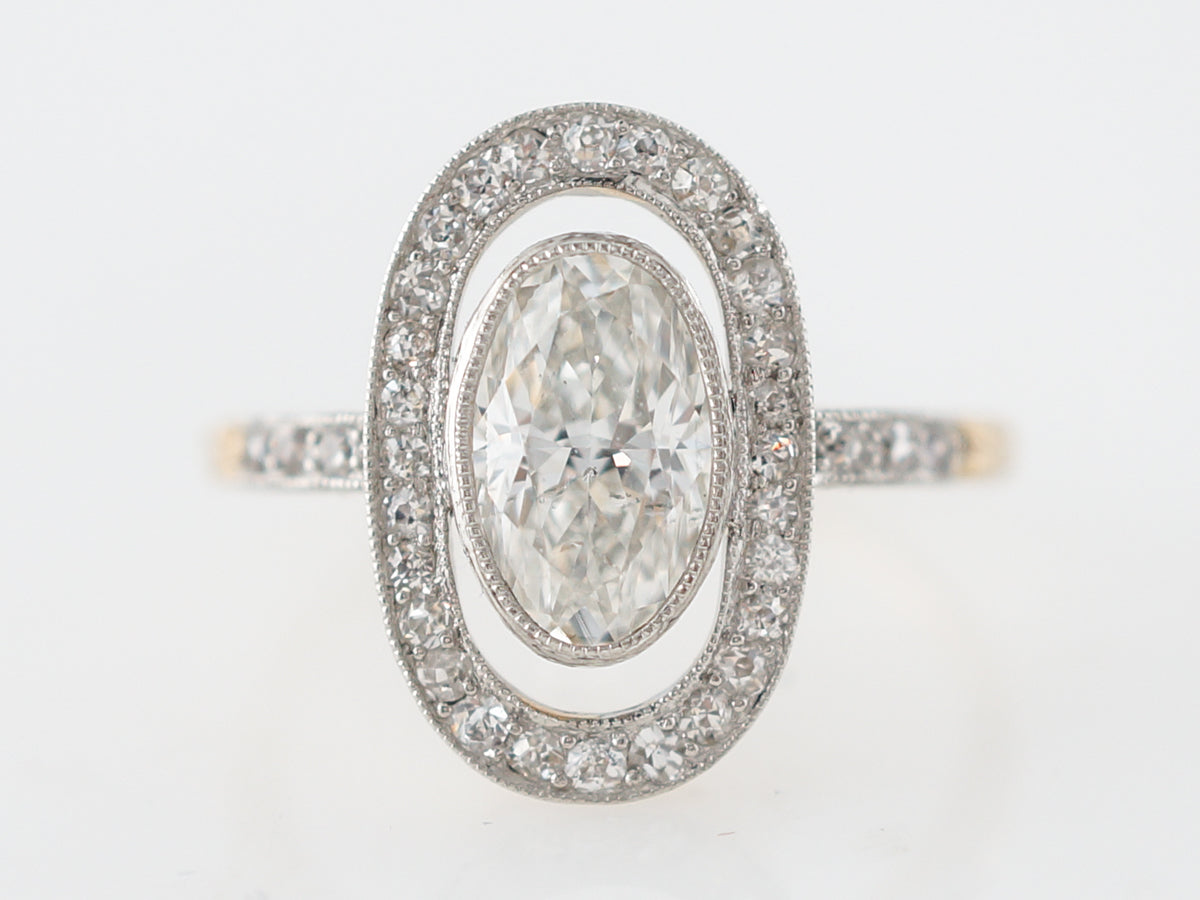 Vintage Victorian Oval Cut Diamond Halo Engagement Ring in Platinum & 14k Yellow Gold