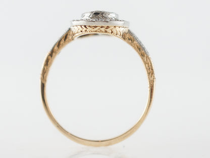 Vintage Victorian Oval Cut Diamond Halo Engagement Ring in Platinum & 14k Yellow Gold