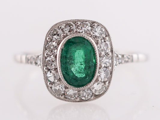 Oval Cut Emerald & Diamond Right Hand Ring in Platinum