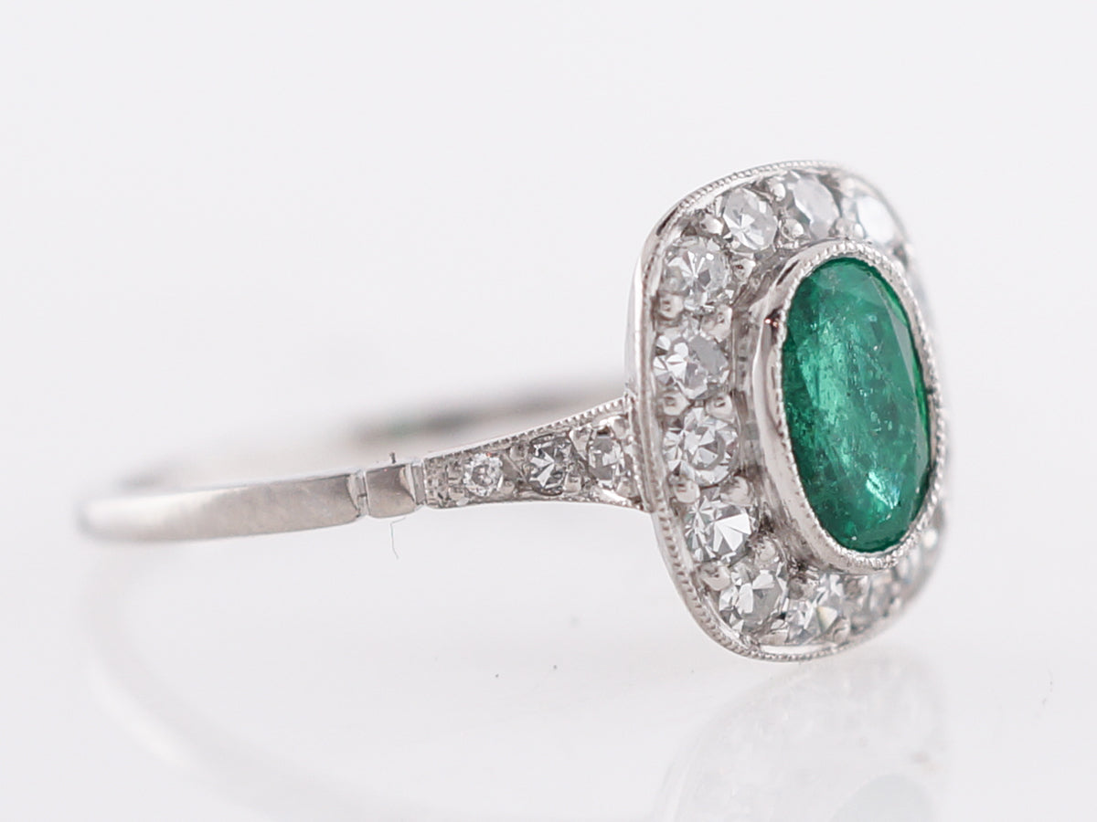 Oval Cut Emerald & Diamond Right Hand Ring in Platinum