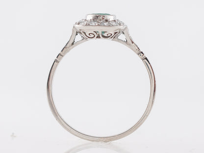 Oval Cut Emerald & Diamond Right Hand Ring in Platinum