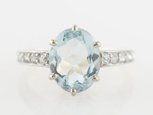 Retro Two-Tone Oval Cut Aquamarine Engagement Ring