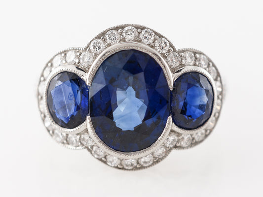 Three Stone Oval Sapphire & Diamond Ring in Platinum