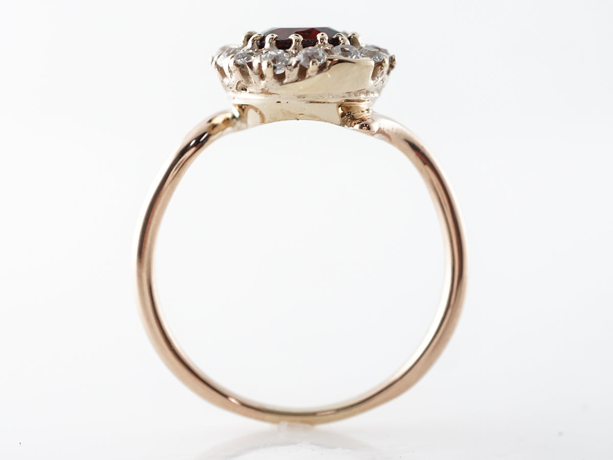 Vintage Victorian Garnet & Diamond Halo Ring in 14k