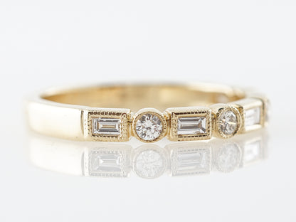 Baguette & Round Brilliant Diamond Band in Yellow Gold