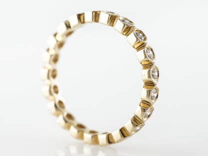 Yellow Gold Bezel Diamond Eternity Wedding Band